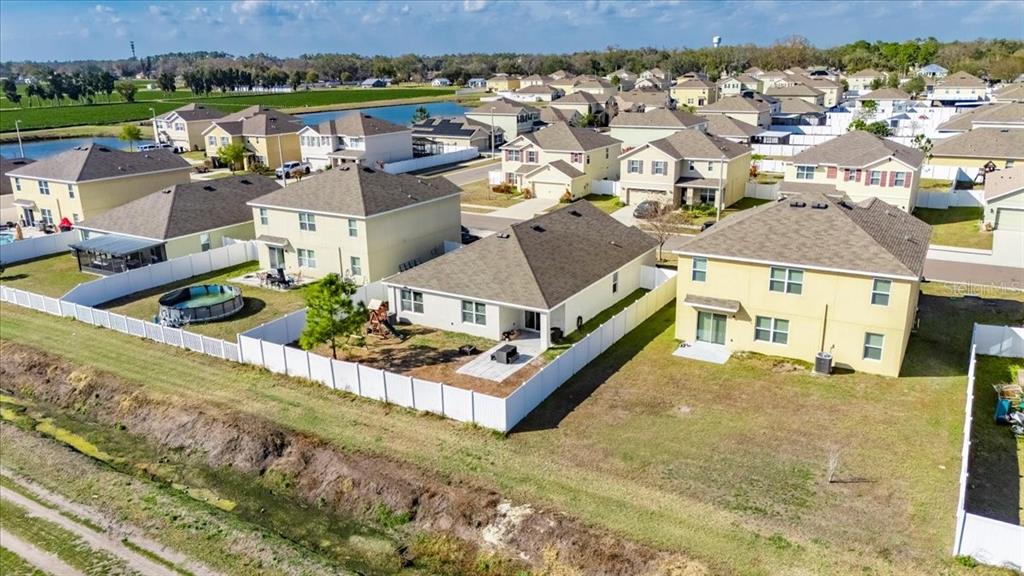 3246 South Northview Road Plant City, FL 33566 - Photo 56 of 57 an aerial view of a house with a yard