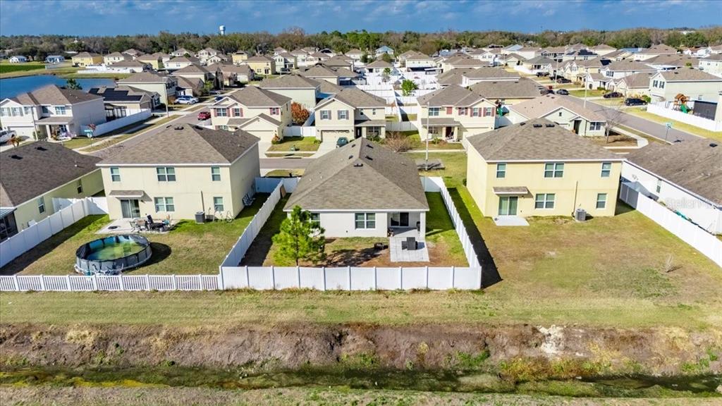 3246 South Northview Road Plant City, FL 33566 - Photo 57 of 57 an aerial view of residential houses with outdoor space