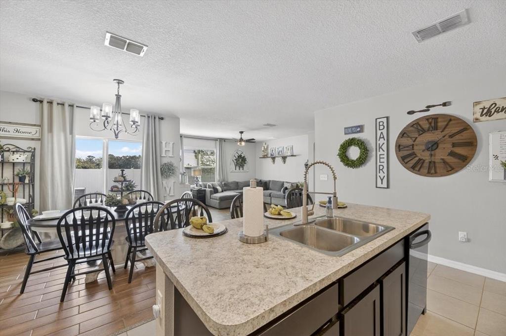 3246 South Northview Road Plant City, FL 33566 - Photo 6 of 57 a kitchen with sink and cabinets