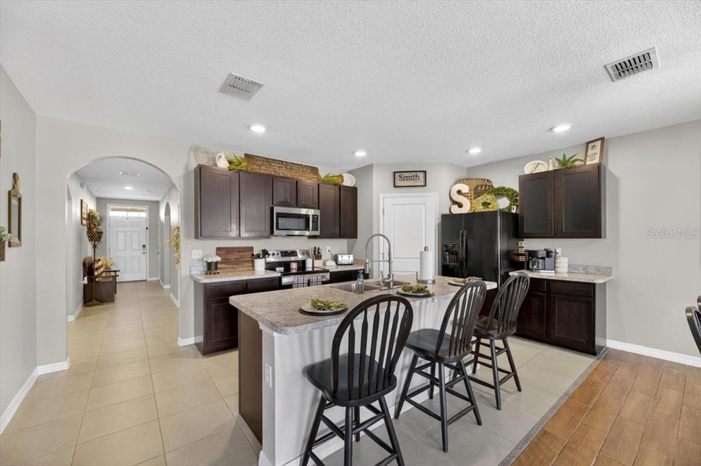 3246 South Northview Road Plant City, FL 33566 - Photo 7 of 57 a view of a dining room with furniture