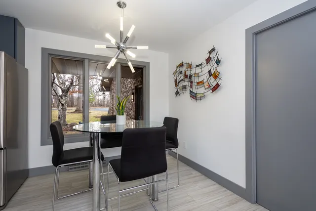 a kitchen with granite countertop a sink and a window