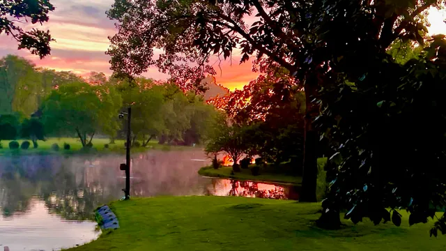 a view of a lake with a big yard