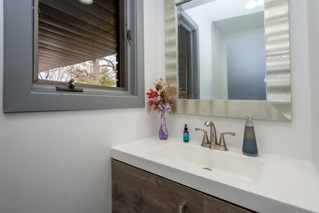 a children room with furniture and a wooden floor
