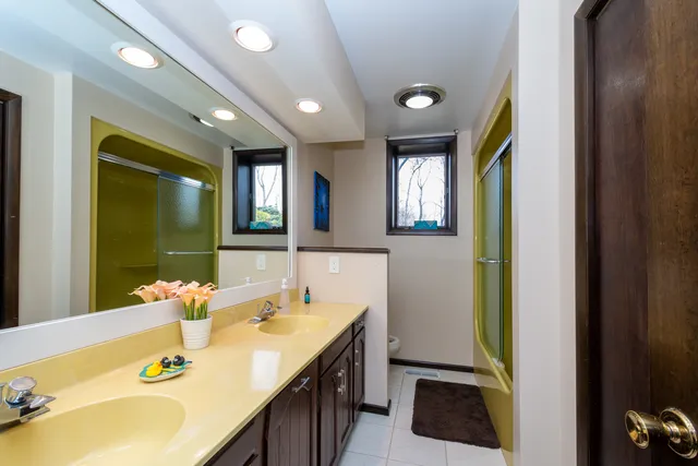 a view of a lake with houses with outdoor space