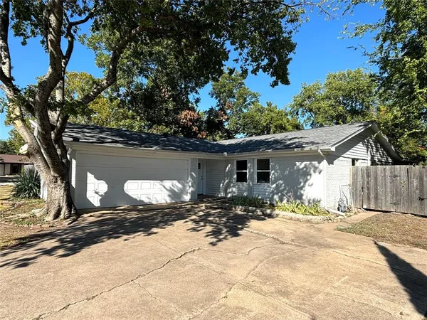 a kitchen with a stove and a sink