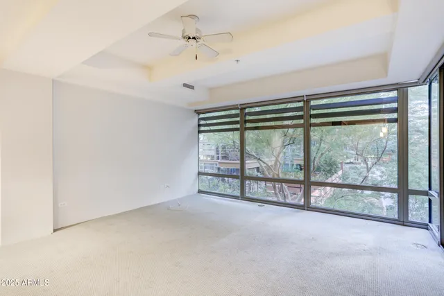 a view of an empty room with a sliding door