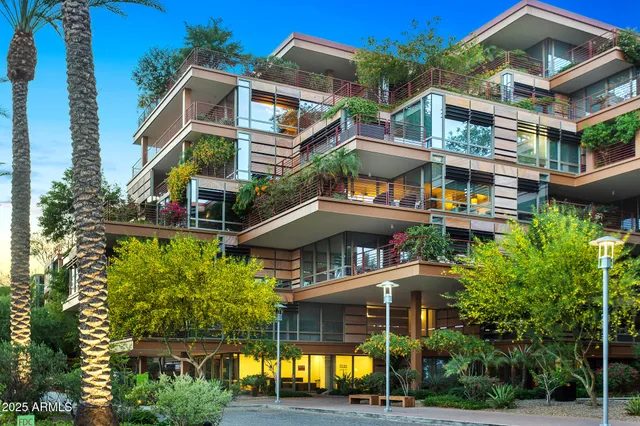 a view of a building with a garden