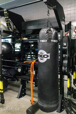 a sign that is on a pole on the wall