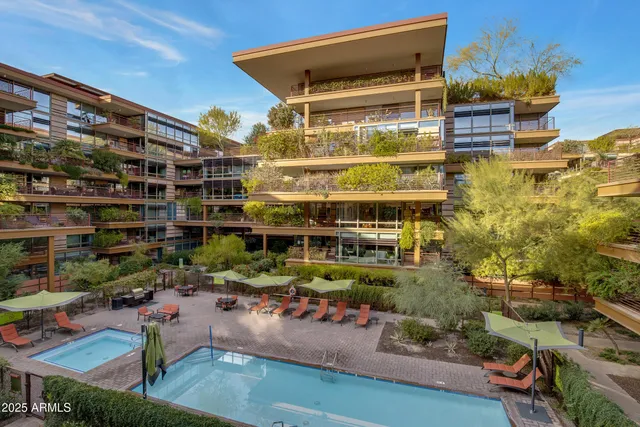 an aerial view of a house with a garden