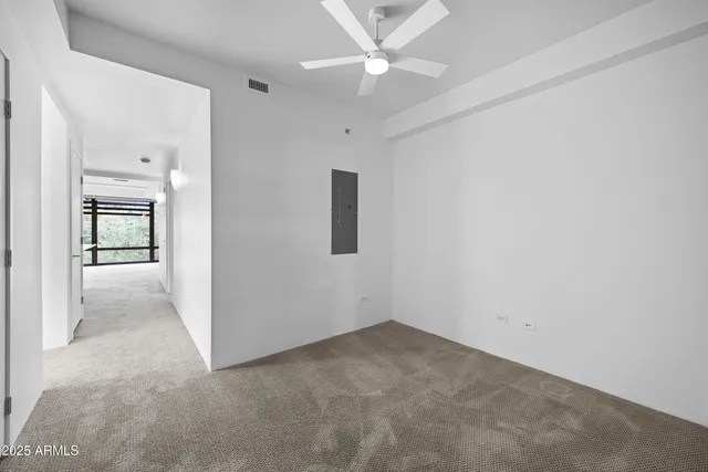 an empty room with a bathroom