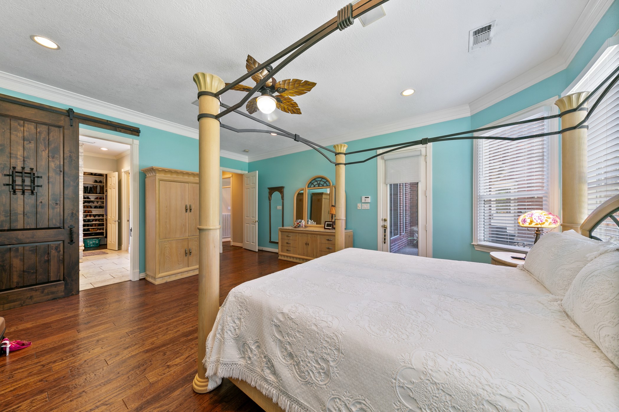 13915 Springmint Drive Cypress, TX 77429 - Photo 21 of 43 a bedroom with a bed dresser and a large window