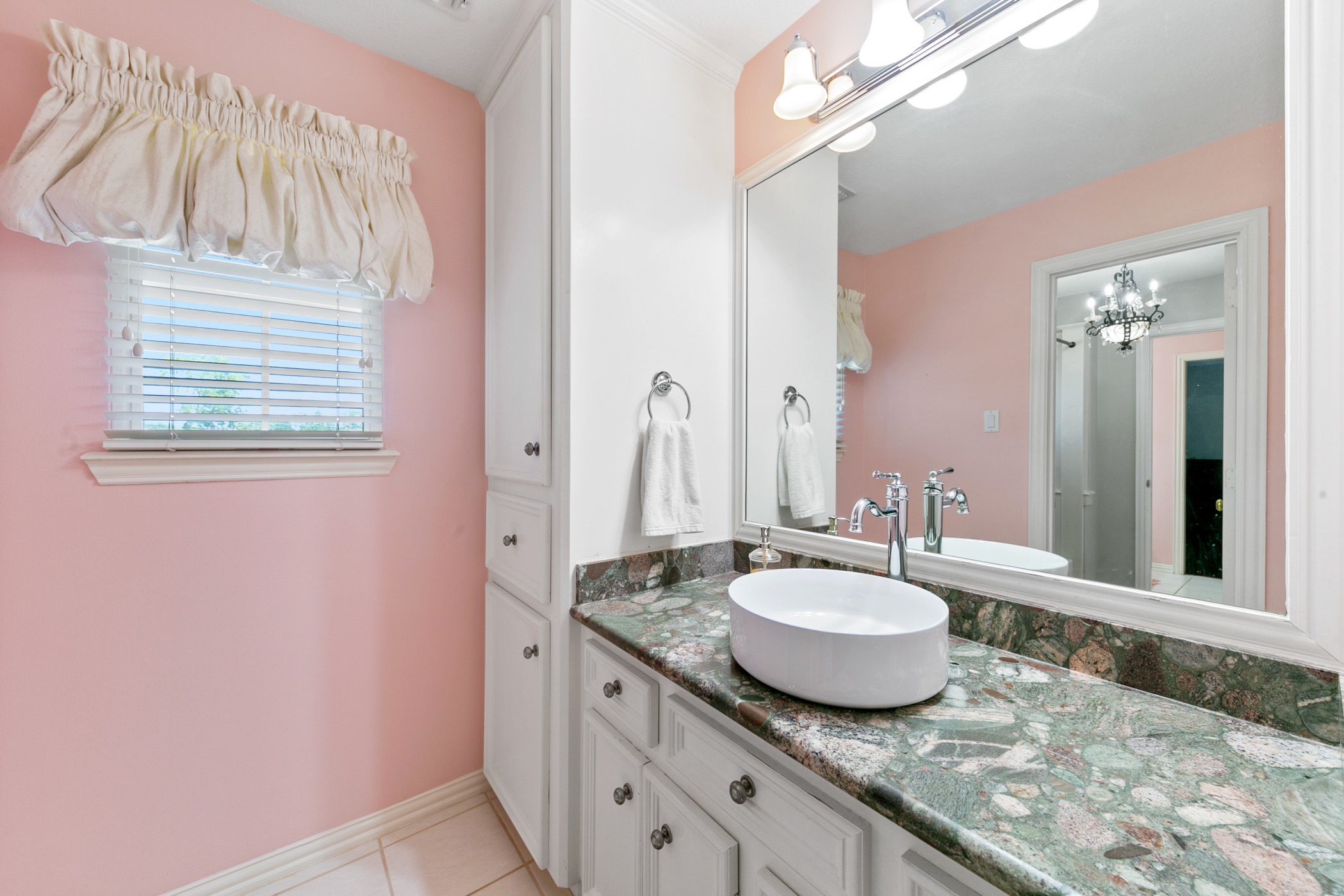 13915 Springmint Drive Cypress, TX 77429 - Photo 32 of 43 a bathroom with a granite countertop sink and a mirror