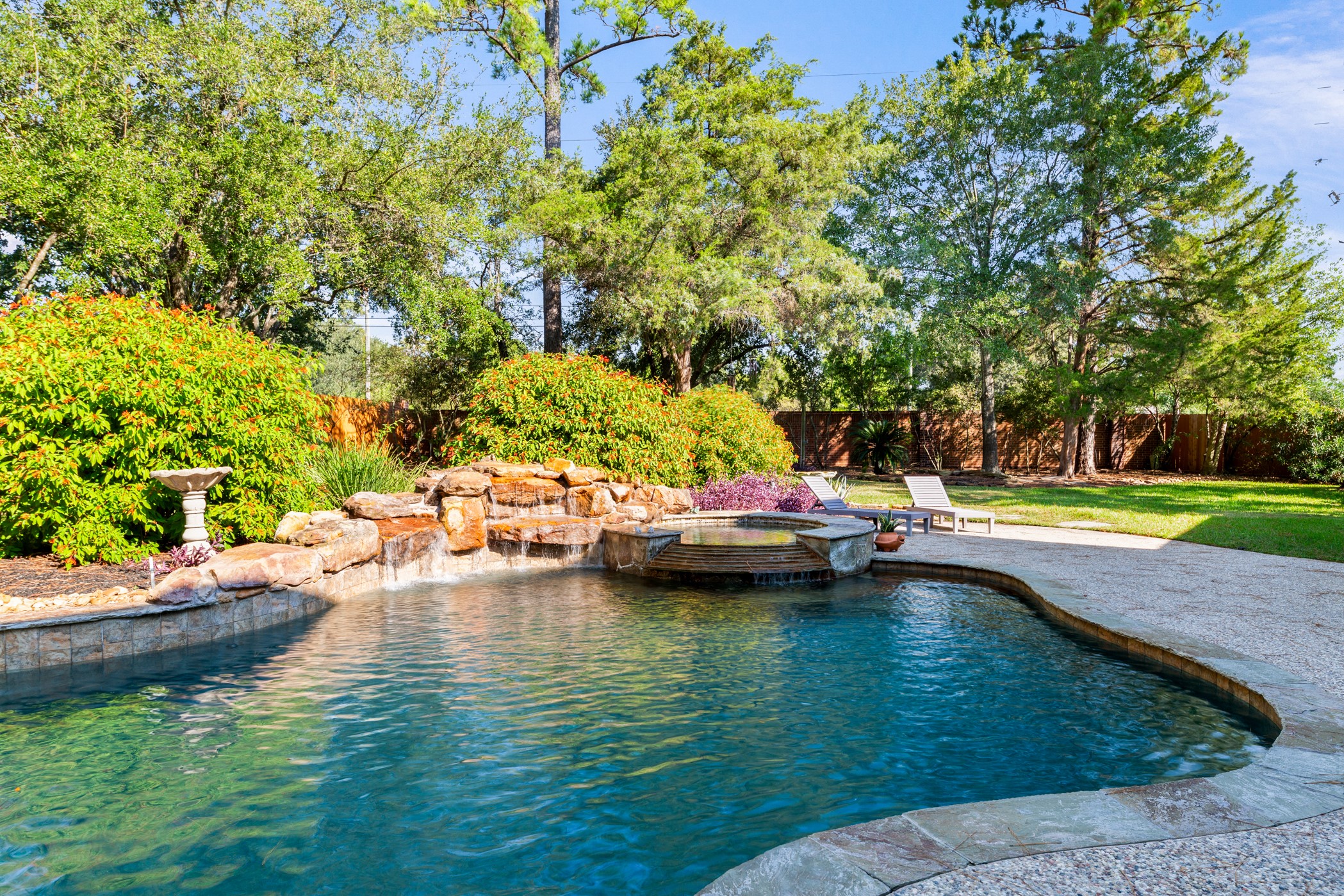 13915 Springmint Drive Cypress, TX 77429 - Photo 34 of 43 a view of swimming pool with lawn chairs and plants