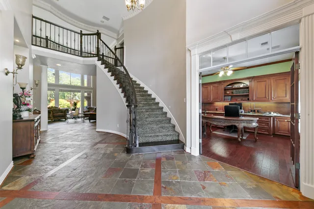 a view of a livingroom with furniture and a rug
