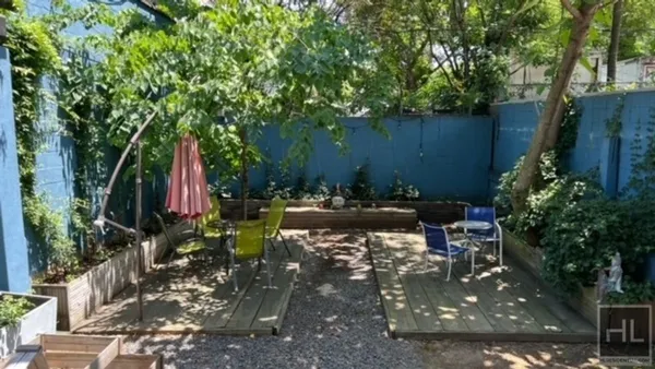a backyard of a house with lots of green space