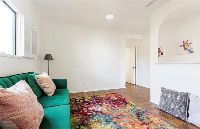 a bedroom with furniture and a bed