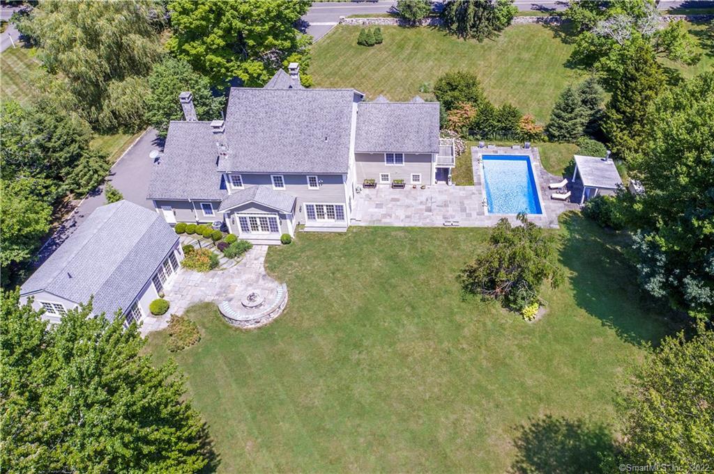 180 St Johns Road Ridgefield, CT 06877 - Photo 1 of 1 an aerial view of a house with garden space and street view