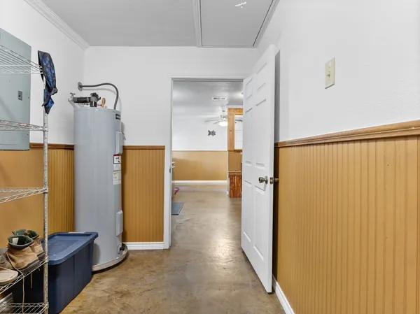 a bedroom with a bed and a table in it