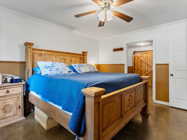 a bathroom with a sink vanity mirror and toilet