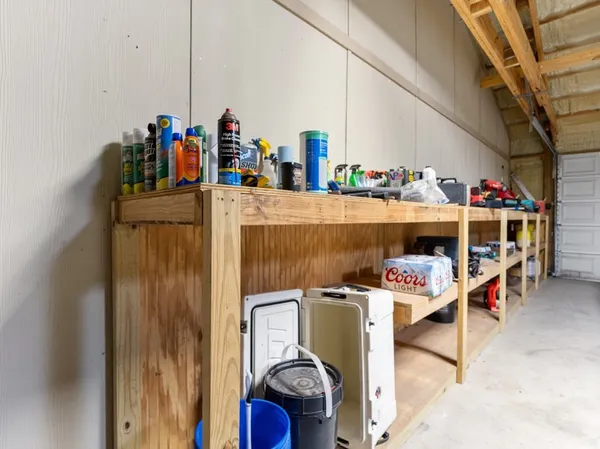 a view of patio with a table chairs and a table