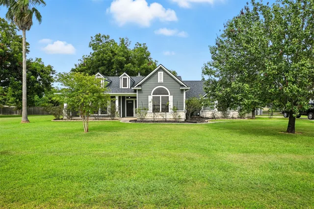 a house view with a garden space