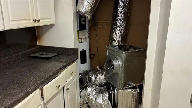 a close view of shoes stand and cabinets