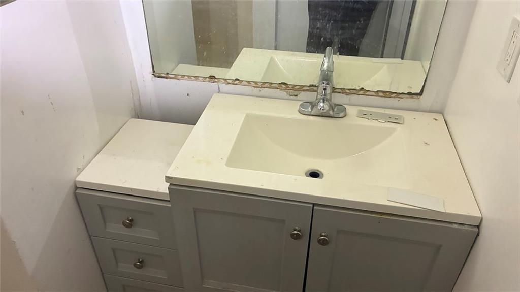 3800 Kensingwood Trace Decatur, GA 30032 - Photo 28 of 58 a bathroom with a sink and a mirror