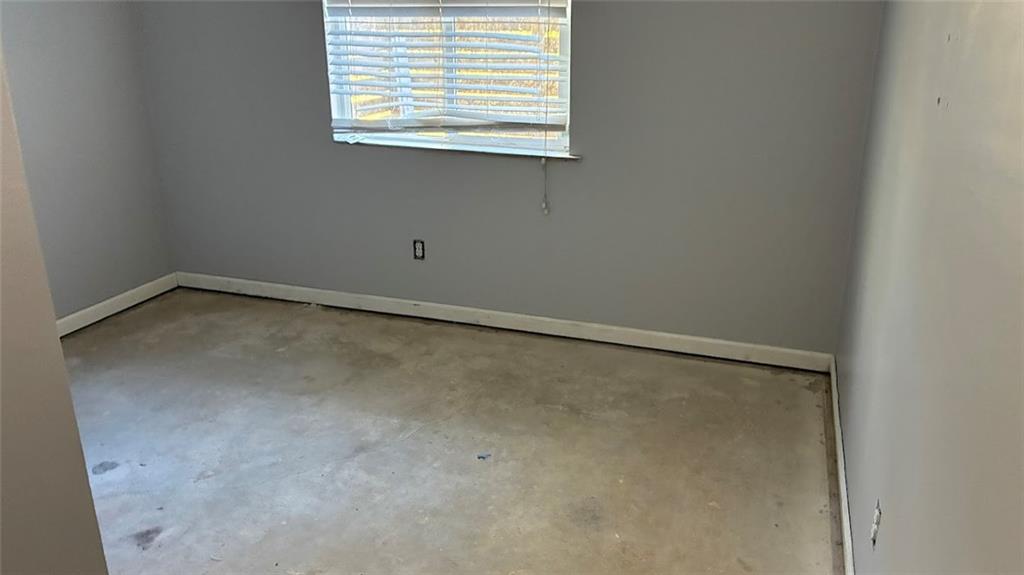 3800 Kensingwood Trace Decatur, GA 30032 - Photo 32 of 58 a view of an empty room with a window