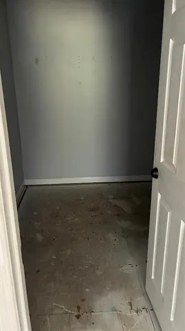 a bathroom with a glass door