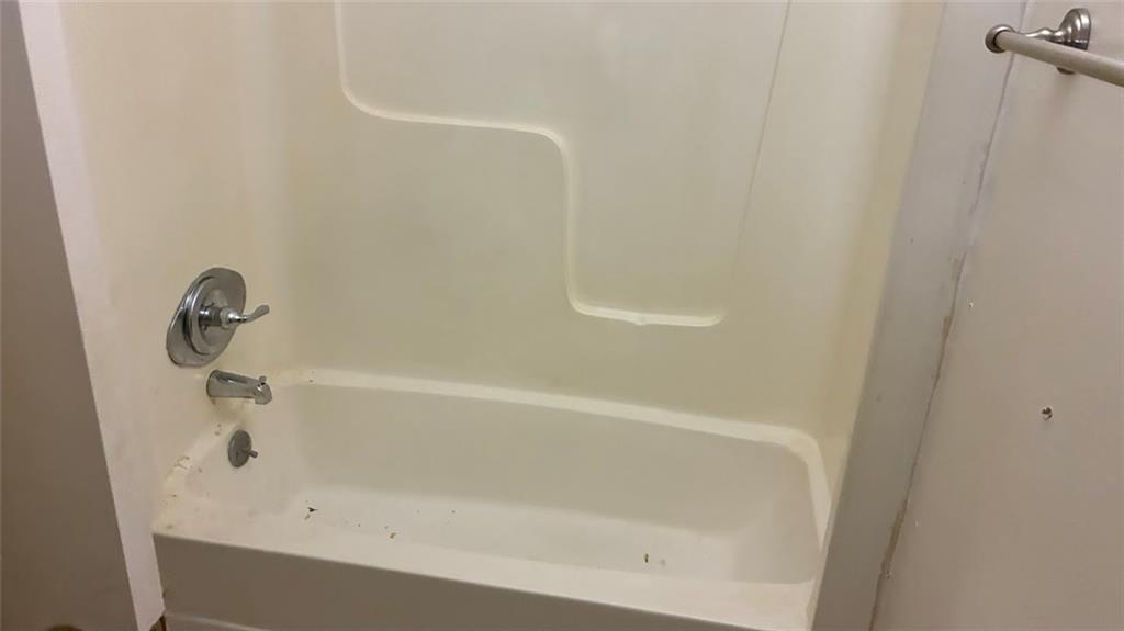 3800 Kensingwood Trace Decatur, GA 30032 - Photo 46 of 58 a close up of a bathtub in a bathroom