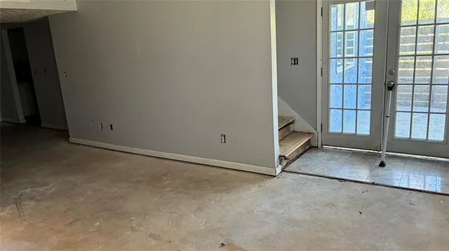 an empty room with windows