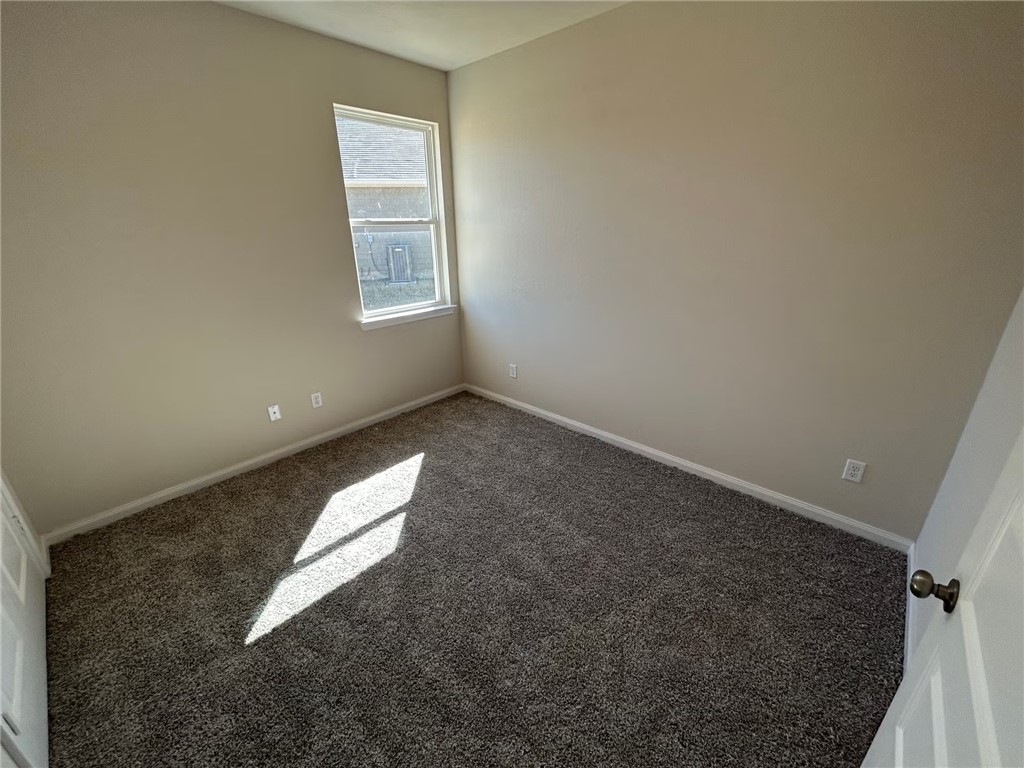 2204 Johnny Lyon Court Bryan, TX 77807 - Photo 5 of 10 an empty room with windows