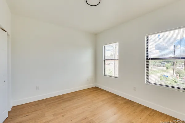 an empty room with windows