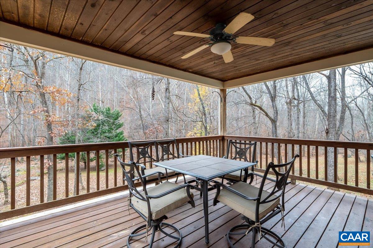 1411 Hill Hollow Road Faber, VA 22938 - Photo 20 of 50 a view of balcony with wooden floor and outdoor seating