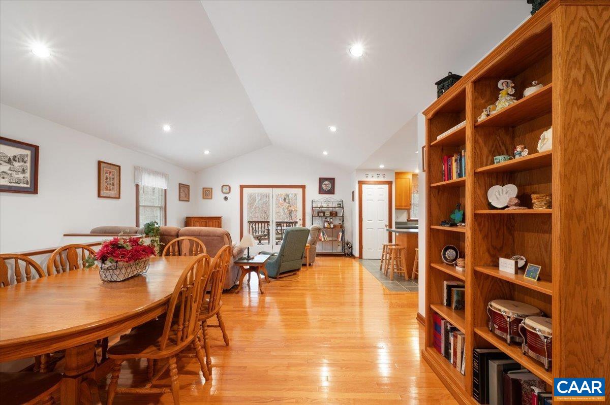 1411 Hill Hollow Road Faber, VA 22938 - Photo 2 of 50 a living room with furniture and a book shelf