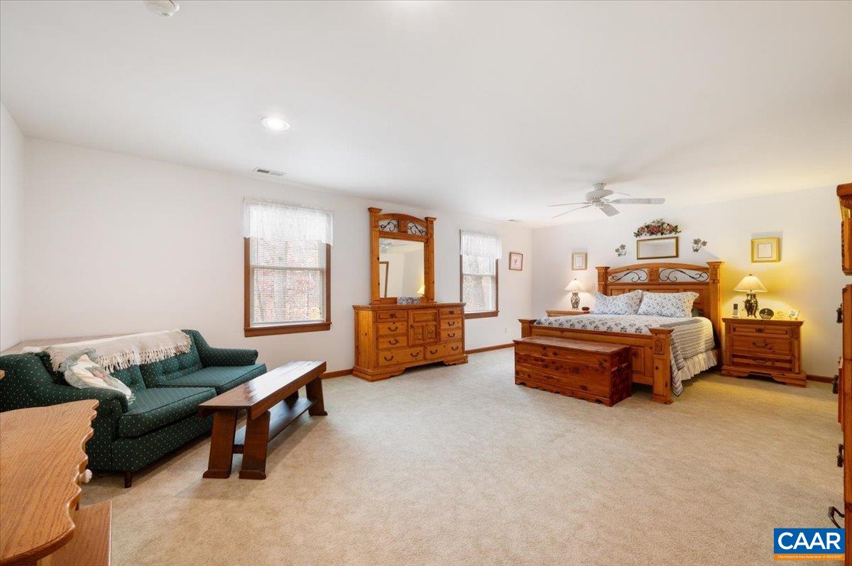 1411 Hill Hollow Road Faber, VA 22938 - Photo 23 of 50 a bedroom with furniture and a couch