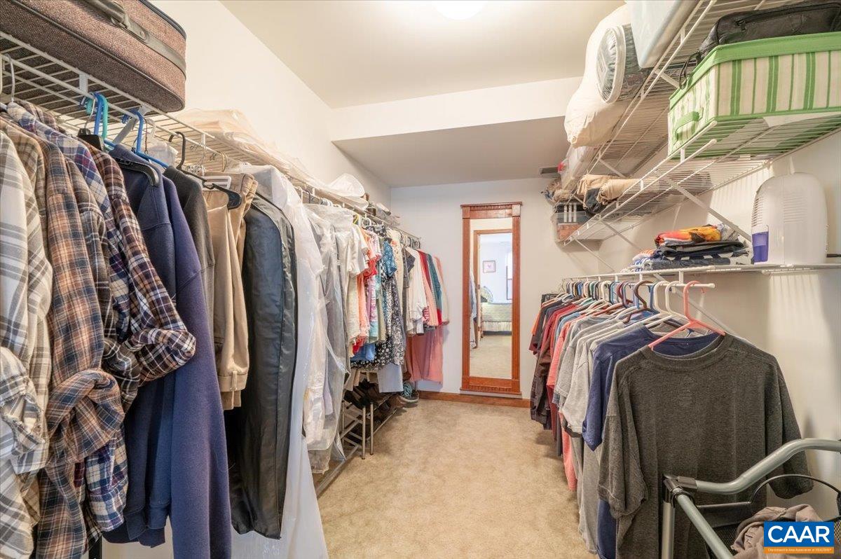 1411 Hill Hollow Road Faber, VA 22938 - Photo 27 of 50 a view of walk in closet with clothes and shoes
