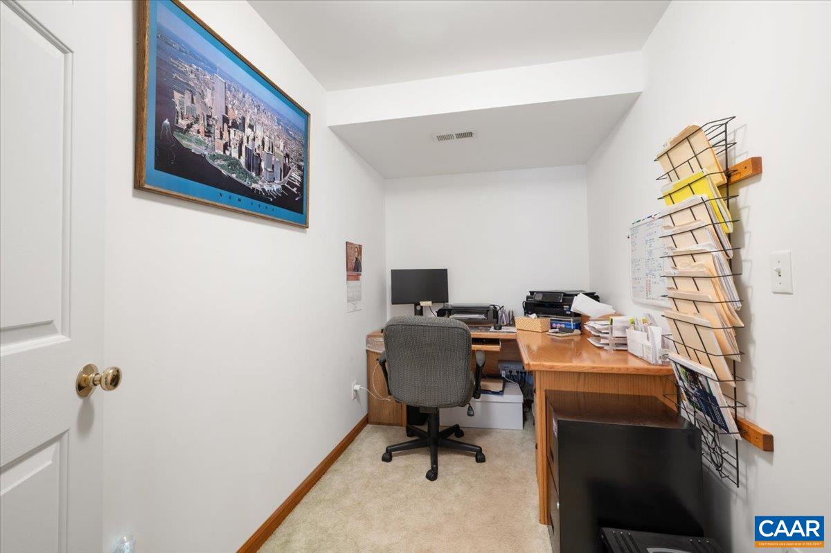1411 Hill Hollow Road Faber, VA 22938 - Photo 28 of 50 a view of a workspace with furniture and a window