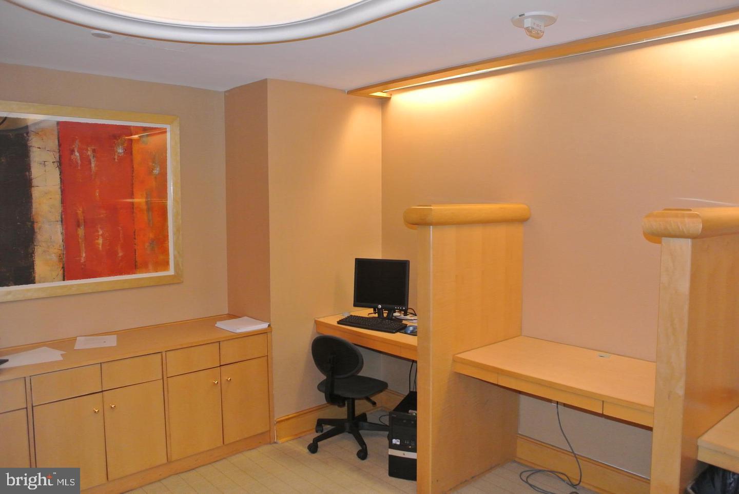 616 E Street Northwest, Unit 447 Washington, DC 20004 - Photo 20 of 28 a view of workspace with windows