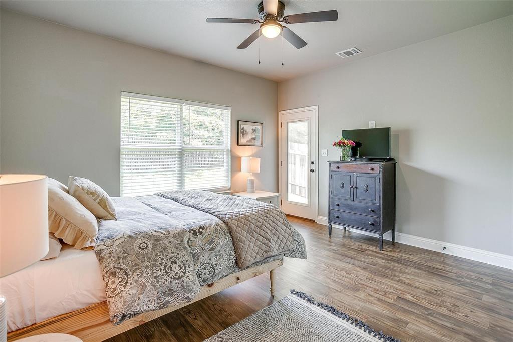 2708 James Road Granbury, TX 76049 - Photo 27 of 34 a bedroom with a bed and window