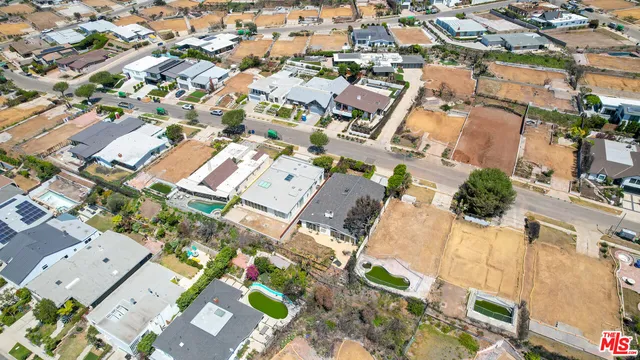 a view of a backyard of a house