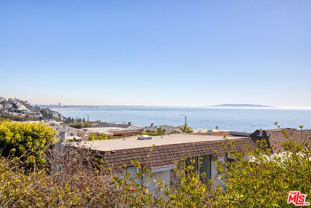 a view of a city and an ocean view