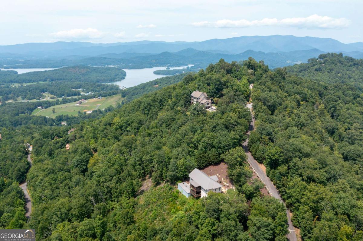 Lot 80 Broken Arrow Trail Hayesville, NC 28904 - Photo 4 of 6 an aerial view of a house with mountain view