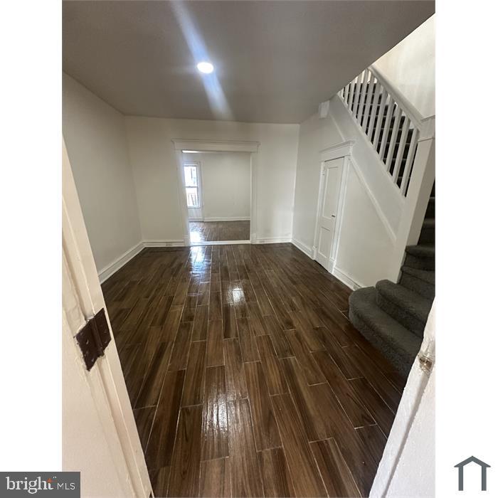3219 North 29th Street Philadelphia, PA 19129 - Photo 6 of 17 a view of an empty room with wooden floor