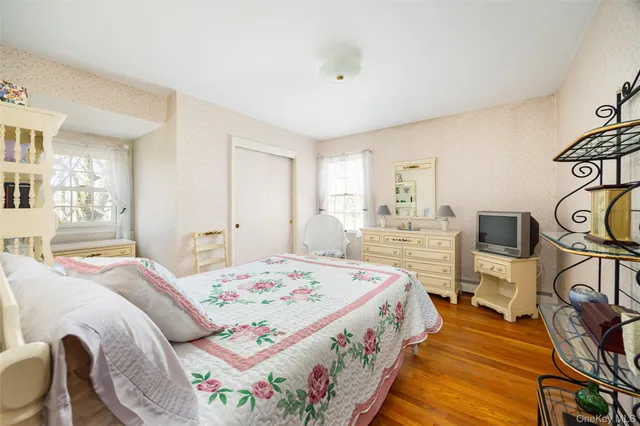 a view of entryway with chandelier and door