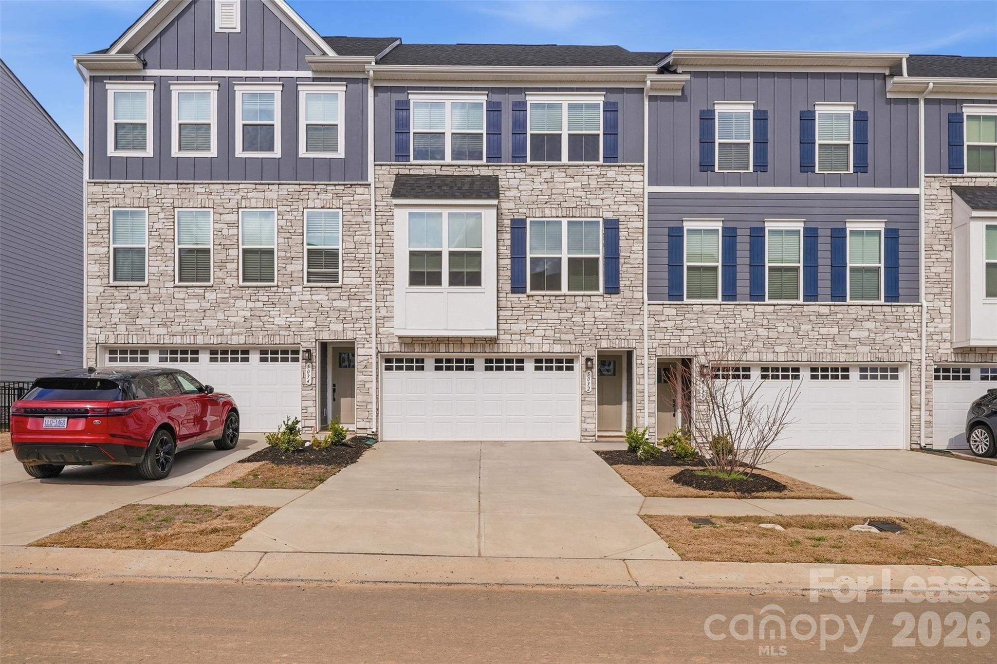 5032 Grain Orchard Road Indian Trail, NC 28079 - Photo 1 of 26 a front view of a building with parking