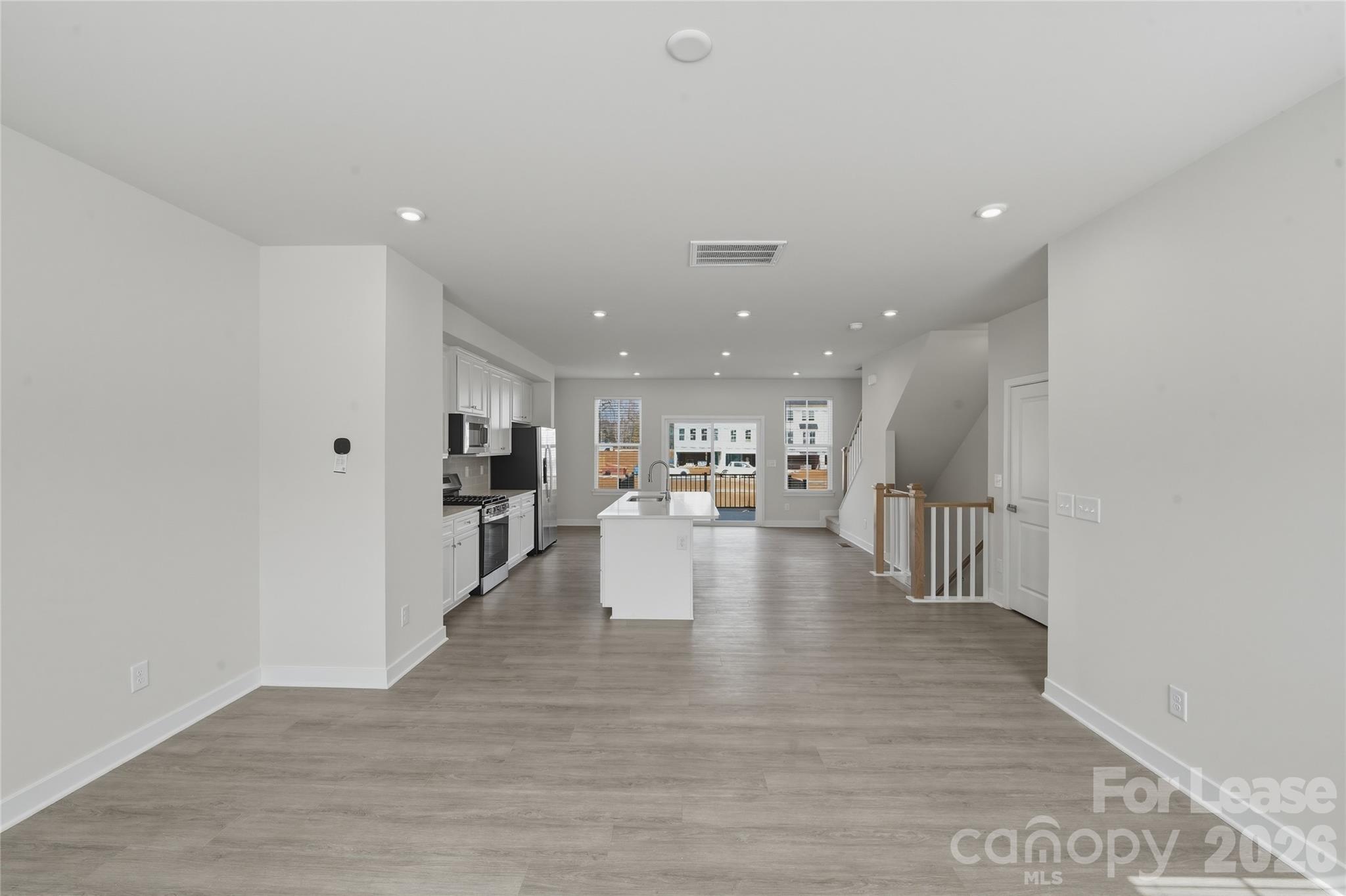 5032 Grain Orchard Road Indian Trail, NC 28079 - Photo 12 of 26 a view of kitchen with furniture and wooden floor