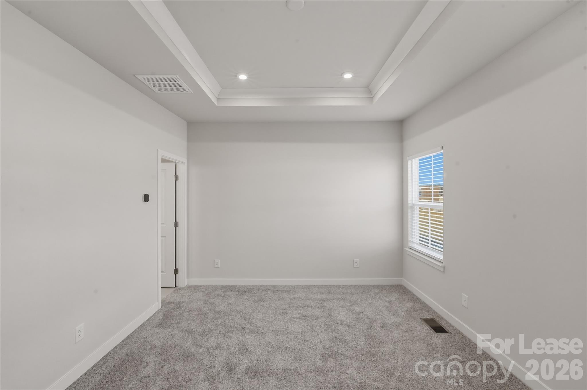 5032 Grain Orchard Road Indian Trail, NC 28079 - Photo 18 of 26 an empty room with windows