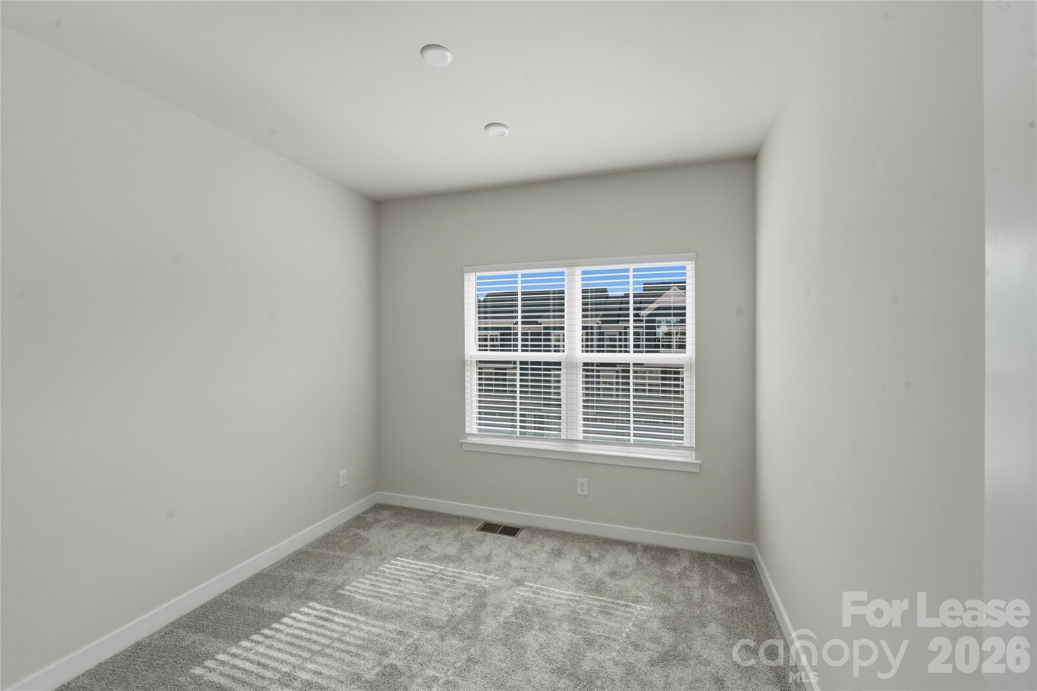 5032 Grain Orchard Road Indian Trail, NC 28079 - Photo 19 of 26 a view of an empty room with a window