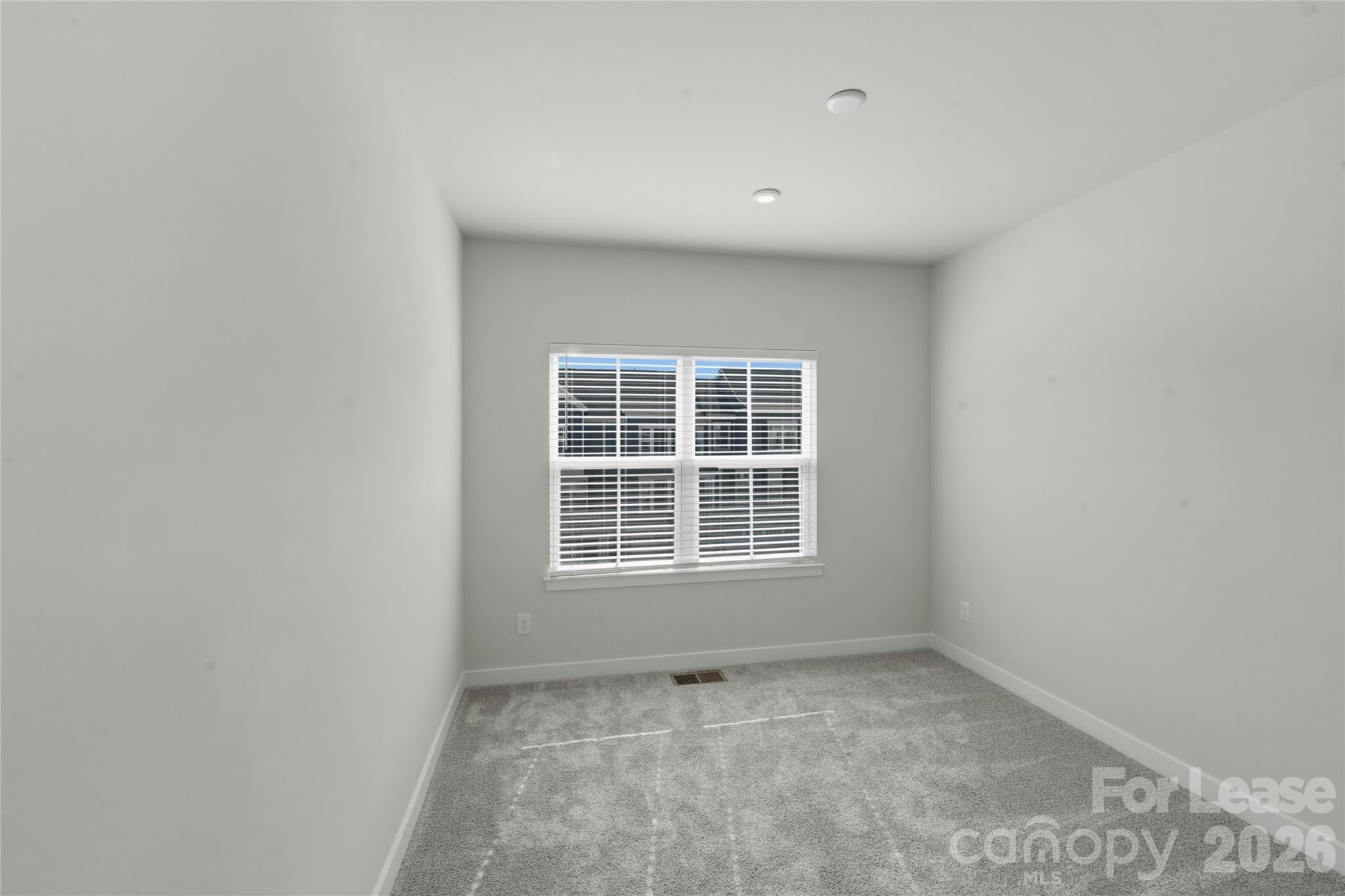 5032 Grain Orchard Road Indian Trail, NC 28079 - Photo 20 of 26 a view of an empty room with a window